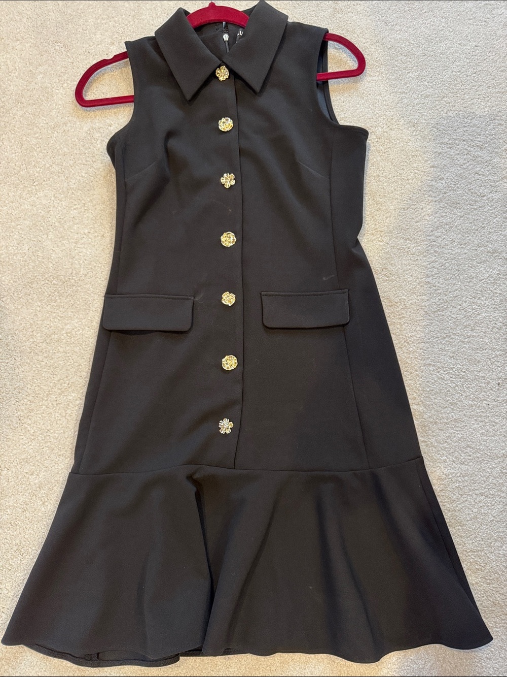 Karl Lagerfeld sleeveless Black Dress with gold buttons and fluted hem.